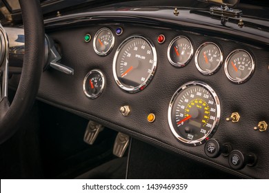dashboard-gauges-classic-car-260nw-1439469359.jpg